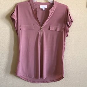 Pink shirt.